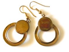 "This is a stunning pair of vintage hand crafted Abalone and brass Modernist circle earrings by local artist Steven Battelle. These earrings are exceptionally beautiful with a rich patina to the brass. A Modern yet organic design that will compliment any outfit... You will be certain to get many compliments! *Steven Battelle has followed a singular, somewhat circuitous route to his current incarnation as a designer of unique treasures of wearable art. Diverging from an early interest in painting Nickel-free Bronze Circular Jewelry, Nickel Free Circle Bronze Jewelry, Antique Gold Brass Jewelry, Antique Gold Round Brass Jewelry, Adjustable Brass Round Disc Jewelry, Retro Gold Brass Earrings, Artisan Round Brass Jewelry, Adjustable Vintage Round Hoop Earrings, Bronze Circular Brass Earrings