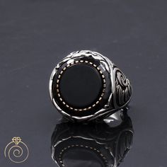 Men's birthstone for Leo onyx gemstone statement ring which will give you a head turning presence. This mystic, vintage style, engraved ring has a unique design for the polished, refined, and distinguished man. Perfect for casual and formal events, it will make your friends envious as you walk into the room full of confidence and pride. Looking for a unique, one of a kind GIFT FOR HIM, groomsman gift, father's day gift, teacher day gift? Look no further. This cool gemstone ring is the right answ Spiritual Black Engraved Sterling Silver Ring, Silver Onyx Gemstone Signet Ring, Onyx Signet Ring Gift, Onyx Signet Ring For Gift, Engraved Onyx Rings For Gifts, Engraved Round Onyx Jewelry, Gift Engraved Onyx Rings, Luxury Adjustable Black Rings, Silver Onyx Signet Ring