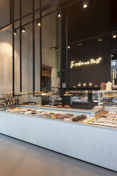 a bakery with lots of different types of pastries