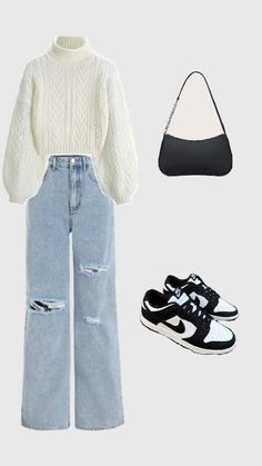 a white sweater, black and white shoes, and a purse