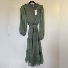 Nwt Moon River Green Floral Cottagecore Tiered Ruffle Smocked Long Sleeve Maxi Dress. Size Small. Comes With Extra Buttons For Top Of The Back And Removable Belt. Vacation, Casual, Tiered, Formal, Floral, Flower, Blue, Green, Pink, Ruffles, Boho, Bohemian, Cottagecore, Grandmacore, Church, Modest, Smocking. Please Ask All Questions Prior To Purchasing So There Is No Confusion! Make Me An Offer Boho Floral Maxi Dress, Cold Shoulder Maxi Dress, Tie Maxi Dress, Embroidered Maxi Dress, White Halter Maxi Dress, Striped Maxi Dresses, Maxi Knit Dress, Long Sleeve Maxi, Long Sleeve Floral Dress