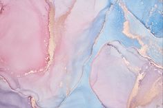 an abstract painting with pink, blue and gold colors on it's surface that looks like marble