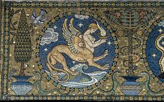 an ancient mosaic depicting two winged creatures