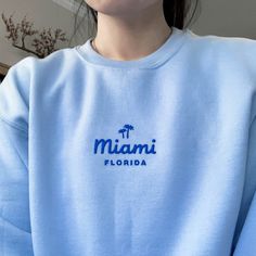 "*SIZES ARE UNISEX* -For women, I'd suggest your usual size for a regular fit (size up for a more relaxed fit). Men should size up for a more relaxed fit. *these sweatshirts are extra comfy when oversized 🌴 \"Miami Florida\" embroidered on a comfy vintage-style crewneck. This cute crewneck is inspired by brandy melville and vintage nike sweatshirts. Perfect for any occasion or gift for him or her. A sturdy and warm sweatshirt bound to keep you warm in the colder months. A pre-shrunk, classic fi Vintage Nike Sweatshirts, Relaxed Fit Men, California Sweater, Cute Crewneck, Vintage Nike Sweatshirt, Tree Sweater, Christian Sweatshirt, Florida Beach, Vintage Crewneck