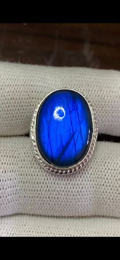 Stainless steel Ring with Royal blue labradorite stone || size=7 US || size=7 us pieces=1 gram= 8.47 (with stone) Blue Labradorite Rings As Gift, Blue Labradorite Rings For Gift, Blue Labradorite Rings For Gifts, Gift Blue Labradorite Rings, Blue Moonstone Cabochon Ring, Blue Labradorite Ring, Blue Labradorite Moonstone Ring, Stainless Steel Ring, Blue Labradorite