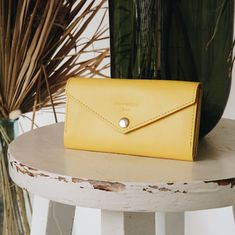 If you are looking for more leather accessories - welcome to my store https://www.etsy.com/shop/SquirrelsBags A lovely, deep Yellow women's wallet handmade from high quality leather. This beautiful, bright wallet will attract money with its lucious color :) It is long, so that you don't have to fold your money. It has a zipper section in the middle, for wallet mice and loose change. The button at the front will keep it securely locked. A special credit card section will hod 12 cards. Please, cho Cheap Everyday Yellow Wallets, Yellow Coin Purse With Card Slots As Gift, Modern Envelope Wallet For Gifts, Modern Envelope Wallet For Gift, Modern Envelope Wallet As A Gift, Modern Envelope Wallet Gift, Elegant Yellow Wallet, Yellow Card Holder With Card Slots As Gift, Everyday Envelope Card Holder