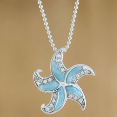 A lovely starfish, arms in fluid motion, is the star of this pendant necklace handcrafted by Thai artisan Michael Krainer. Set in sterling silver, the arms of the starfish are larimar lined with a row of sparkling cubic zirconia. Travel Necklace, Starfish Pendant, Larimar Pendant, Jewelry Workshop, Cz Pendant, Earring Crafts, Jewelry Packaging, Animal Jewelry, Jewelry Gift Box