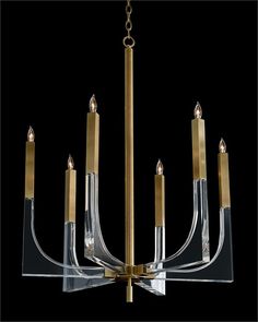 a chandelier with six candles hanging from it