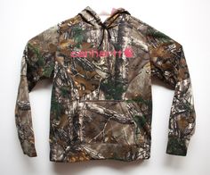 Carhartt RealTree Forest Camo Hoodie Sweatshirt Boy's Size Medium Pullover Front hand warmer pocket Carhartt logo on the chest 3" waistband Lightweight fleece lining Brand : Carhatt Size : M ( 8/10) Color : Multi color camo color RealTree pattern Material : Polyester/Cocona Measurements Underarm to underarm 20" Length ( Shoulder to hem) 25" Sleeve length 36" Carhartt Hoodies, Western Hoodies, Fishing Hoodie, Country Accessories, Aesthetic Cowgirl, Vacation Fits, Country Fits, Western Stuff, Casual Country Outfits