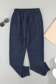 Blue Solid Drawstring Elastic Waist Pants with Pocket Blue Stretch Pants For Leisure, Navy Bottoms For Loungewear In Winter, Casual Stretch Blue Sweatpants, Blue Stretch Sweatpants For Winter, Blue Stretch Casual Sweatpants, Casual Blue Stretch Sweatpants, Casual Blue Leggings With Pockets, Blue Ankle-length Sweatpants For Loungewear, Casual Blue Leggings For Winter