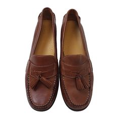 Elegant and stylish, these Cole Haan Leather Tassel Embellished Loafers in size 8.5 are perfect for any formal event or casual outing. The fine leather finish and tassel embellishment offer a sophisticated look.• High-quality leather construction• Tassel embellishment for added style• Classic loafer design• Ideal for both formal and casual wearDoes not come with box.Size: Mens 8.5Approximate Measurements:Heel Height 1 in / 3 cmCondition: Pre-Owned GoodAll pieces are stored in a smoke-free, pet-free environment. If flaws are identified on the item, this will be disclosed in the description. Thank you for shopping with The Untamed Thread! Brown Slip-on Moccasins With Tassels, Brown Oxfords With Tassels And Round Toe, Classic Slip-on Moccasins With Tassels, Brown Tassel Loafers With Round Toe, Classic Slip-on Dress Shoes With Tassels, Brown Leather Shoes With Tassels And Round Toe, Classic Leather Moccasins With Tassels, Classic Tassel Slip-on Loafers, Classic Leather Oxfords With Tassels