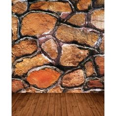 an old stone wall with wood flooring