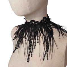 Fashion black ostrich fringe feathers collar with black lace embellish  One size, adjustable.  Length: 12 Inches Width:  4-6 Inches  Fastens with double satin ribbon on the back.  It is perfect to wear with corset, evening or with wedding dress, or a perfect romantic gift.  Find more accessories here in my shop : https://www.etsy.com/shop/HouseOfTooFan Please note that due to lighting effects, monitor's brightness, contrast and other settings, there might be some slight differences in the color tone/shade of the website's photo and the actual item. Item photos are enlarged to show details- please note actual sizes. All my items are handcrafted, that's why sizes and shapes may vary. !! Important notice !! If this is a gift or you need it at an exact date, please check the delivery time, als Black Gothic Costume Accessories, Gothic Black Choker For Costume, Gothic Party Choker, Black Feathered Jewelry For Party, Black Feather Jewelry For Party, Adjustable Black Choker For Costume Party, Black Lace Party Jewelry, Bohemian Black Choker For Wedding, Bohemian Black Wedding Choker