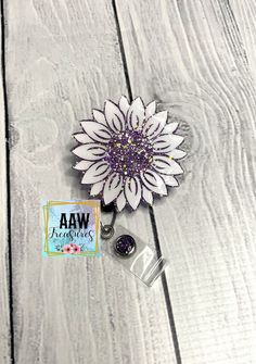 *White petals with purple mix Glitter. If you want different colors, please send me a message, I'd be more than happy to customize! *Badge reels are made to order. Please allow 2-3 weeks for items to be made prior to shipping. *Sunflower is about 2 inches. The are made with acrylic and UV resin. *Alligator swivel retractable badge reel or belt clip are available. *Shipped badge reels are enclosed in a zip bag packaging. *Epoxy can break if handled harshly or dropped. If you are wanting something Personalized Purple Badge Reel Gift, Personalized Purple Badge Reel For Gift, Personalized Purple Badge Reel As Gift, Adjustable Purple Badge Holders As Gift, White Petals, Custom Badges, Retractable Badge Reel, Zipped Bag, Bag Packaging