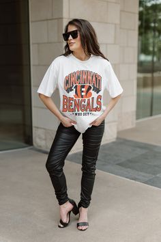 CINCINNATI BENGALS SHAKEDOWN OVERSIZED CREWNECK TEE Trendy Short Sleeve T-shirt For Game Day, Oversized Pre-shrunk T-shirt For Game Day, Oversized Graphic Tee For Game Day, Oversized T-shirt For Game Day In Fall, Oversized Short Sleeve Fan Merchandise T-shirt, Oversized Sporty T-shirt For Game Day, Trendy Game Day T-shirt With Short Sleeves, Trendy Game Day Short Sleeve T-shirt, Bengals Shirts