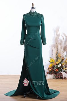 Shiny crystals embellishments enhance the stylish definition of the decent high neckline, long sleeves and high side slit design on this emerald satin mermaid dress. It is a striking choice for prom party. Dark Green Prom Dress Long Sleeve, Dark Green Prom Dress Long, Elagant Dress, Dark Green Prom Dress, Green Prom Dress Long, Plain Midi Dress, Satin Mermaid Dress, Shiny Crystals, Satin Outfits