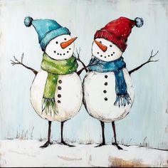 two snowmen standing next to each other wearing hats and scarves