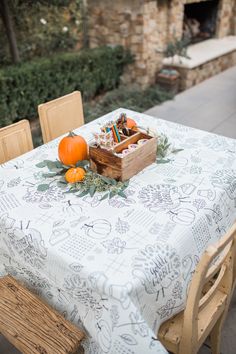 the table is set with an orange and some other items