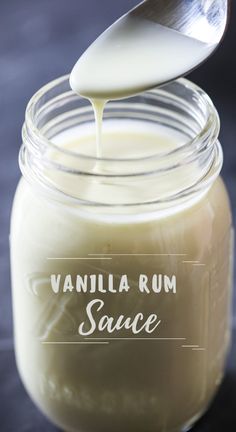 vanilla rum sauce in a glass jar with a spoon