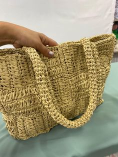 Our product is knitted with 100% raffia yarn.  The lining with pockets has been made in the interior detail and is mounted to the bag with a zipper.  Our bag is designed to be used as a beach bag whether you want daily use or not. I believe that you will also like this bag, which I have Decently knitted together many motifs for you, very much. the most trendy model of recent times is waiting to meet you. Our product has a width of 45 cm, a height of 32 cm and a shoulder strap of 59 cm is made. Casual Jute Crochet Bag With Double Handle, Casual Crochet Bag With Double Handle, Casual Jute Shoulder Bag With Double Handle, Woven Crochet Shoulder Bag For Beach, Large Capacity Jute Crochet Bag With Double Handle, Casual Crochet Shoulder Bag With Braided Handles, Open Weave Jute Shoulder Bag With Double Handles, Double Handle Jute Shoulder Bag With Open Weave, Open Weave Double Handle Jute Shoulder Bag