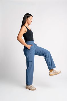 Our softest, stretchiest, most versatile pant yet. Featuring lightweight yet durable Global Recycle Standard certified nylon blended with spandex, the go explore essential cargo pant was crafted to be the only outdoor pant you need. Expertly tailored and designed by women for the perfect fit, these pants feature: Soft, stretchy, secure high waisted fit with an internal adjustable drawstring Five pockets, including side cargo pocket Lightweight, quick dry fabric (Global Recycle Standard certified Versatile 4-way Stretch Cargo Pants, Non-stretch Full-length Cotton Cargo Pants, 4-way Stretch Hiking Bottoms With Functional Pockets, Outdoor 4-way Stretch Pants With Pockets, 4-way Stretch Cargo Pants With Side Pockets For Outdoor, Fabric Factory, Outdoor Pants, Activewear Sets, Cargo Pant