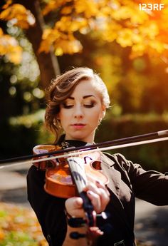 Portrait of a girl playing a violin outdoor in brown coat on autumn #hobby #passion Playing A Violin, Girls Play, Brown Coat, Violin, A Girl