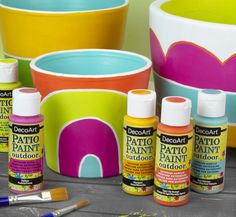 the paint is being used to decorate pots