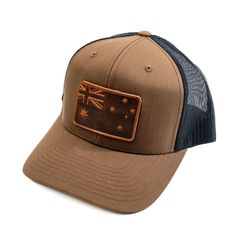 From the Land Down Under to the Top of Your Head The cap presents a tribute to Australian heritage with a beautifully crafted leather patch that features the iconic Southern Cross and Union Jack, symbols of the Australian flag. The deep, earthy tones of the leather patch resonate with Australia's rugged landscapes, while the meticulous stitching pays homage to the enduring Aussie spirit. Each cap is enhanced with a unique leather patch, subtly showcasing our dedication to durability and design. Adjustable Brown Leather Baseball Cap, Brown Trucker Baseball Cap With Flat Brim, Brown Trucker Cap With Flat Brim, Brown Waxed Finish Hat With Flat Brim, Brown Hat With Waxed Finish And Curved Brim, Adjustable Brown Six-panel Trucker Hat, Brown Waxed Finish Hat With Curved Brim, Brown Flat Brim Hat With Waxed Finish, Brown Waxed Finish Curved Brim Hat