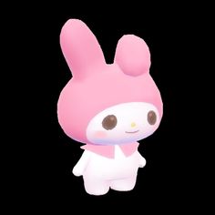 a little pink bunny is standing in the dark