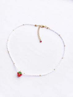 🍓 Strawberry charm necklace 🍓 Pair this cute choker with the matching bracelet for a complete fruity look :) https://www.etsy.com/listing/1009614328/strawberry-charm-bracelet-strawberry?ref=shop_home_active_2 Adjustable length, +2.5 inch gold extender Strawberry charm made with 2mm glass seed beads Rest of the beads are 2mm glass seed beads Gold material: stainless steel (durable & tarnish-resistant) Free gift with all orders 🎁 🌙 Feel free to message me with any questions or requests! 🌙 Che Strawberry Seed Bead Necklace, Fruit Beaded Necklace, Fruit Bead Necklace, Strawberry Choker, Beaded Cherry Necklace, Strawberry Beaded Necklace, Bead Strawberry, Strawberry Beads Necklace, Beaded Strawberry