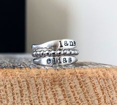 Enjoy FREE shipping on all domestic orders Also order with confidence as all of my orders are being processed and shipped on time according to my 1-2 week processing time. This beautiful ring set is the perfect way to carry your loved ones with you all the time Made from sterling silver U.S Whole sizes only This listing is for two sterling rings and a stainless steel beaded spacer, if you would like one ring please message me :) Please leave your name or date in the notes at checkout, currently Stackable Name Rings, Cedar City, Mother Rings, Name Rings, Personalized Rings, One Ring, Beautiful Ring, Ring Sterling Silver, Stackable Rings