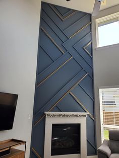 a living room with a fireplace and tv mounted to the wall