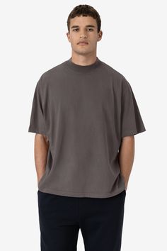 This one-of-a-kind t-shirt is made with comfort in mind. This style features a large sleeve, super high mock neck, and boxy, wide fit around the body. Made of our classic 18 singles open-end jersey, just like the essential 1801GD. Wear with jeans, sweats, or bike shorts for a perfectly oversized look. We recommend ordering 1 size up from your usual size. Garment dyed and enzyme washed for shrink-free, worn-in finish. This item is a garment dye product. Garment dye items can be distinguished by ‚ Oversized Funnel Neck Solid Top, Oversized Solid Funnel Neck Top, Solid Color Oversized Top With Funnel Neck, Casual Turtleneck T-shirt With Relaxed Fit, Casual Mock Neck Top With Relaxed Fit, Oversized Cotton Turtleneck Top, Casual Cotton Turtleneck T-shirt, Oversized Cotton Funnel Neck Top, Relaxed Fit Cotton Funnel Neck Top