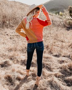 Relaxed Fit 69% Polyamide. 24% Acrylic and 7% Spandex Hand Wash Cold. Dry Flat Crew Neckline Long Sleeves Ribbed Edges Knit Fabrication No Closures Not Lined We're obsessed with the hues on this colorblock sweater! Our Ulla Colorblock Knit Sweater is a gorgeous red. salmon. and mustard contrast with a relaxed fit and a crew neckline. Front tuck this beauty into some dark wash denim. Styled with the Aston Hat. Perfect Hoop Earrings. Mica Chain Choker. Initial Card Necklace. Tidal High Rise Button Red Salmon, Card Necklace, Colorblock Sweater, Front Tuck, Color Block Sweater, Dark Wash Denim, Chain Choker, Knit Sweater, Color Blocking