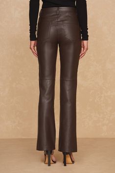 The Kai Pant is a faux leather Fall essential. With a flattering high-rise and skinny-flare silhouette that gives you legs for days, this signature pant is a must for on-trend style. Featuring silver hardware and luxuriously soft, ultra stretchy faux leather, this pant looks incredible on everyone. Sleek Flare Pants For Fall, Brown Leather Pants For Night Out, Sleek Leather Bottoms For Fall, Elegant Flare Leather Pants, Elegant Flared Leather Pants, Chic Full-length Faux Leather Pants, Chic Flared Leather Pants, Chic Flare Leather Pants, Fitted Flare Leather Pants For Work