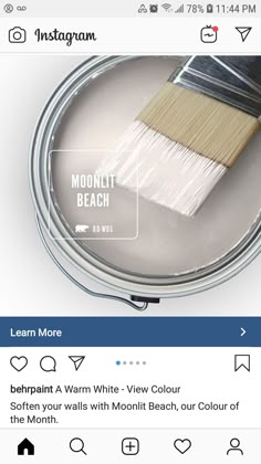 a paint can with a brush in it and the words moonlit beach on top