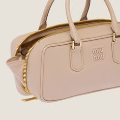 Light padding Leather handles Detachable, adjustable 105 cm leather shoulder strap Gold-tone hardware Varnished metal lettering logo on the front Zipper closure Cotton satin lining with zipper pocket With purse feet Formal Miu Miu Shoulder Bag With Detachable Strap, Miu Miu Formal Shoulder Bag With Detachable Strap, Formal Miu Miu Double Handle Bag, Formal Miu Miu Bags With Adjustable Strap, Miu Miu Formal Bag With Adjustable Strap, Formal Miu Miu Shoulder Bag With Adjustable Strap, Formal Miu Miu Bag With Detachable Handle, Miu Miu Formal Bags With Adjustable Strap, Modern Miu Miu Double Handle Bag