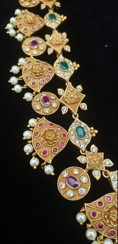 "Handmade Indian Jewelry, best to wear for traditional ceremonies or Indian wedding. This bridal jewelry has an ethnic finish. It has Cubic Zircon stones with semi-precious rubies. It is a Bollywood style one gram jewelry. Handmade Indian Jewelry item * Necklace Set is a combo of Necklace & Stud Earrings * can be used for dual purpose: Necklace or Waist belt * Necklace is adjustable with adjustable back chain/ Dori/ Cord * Earring Length: 1.5\" , Earring Width: 1\" * Necklace length; 32\" ap Diwali Bridal Long Necklace With Tilla, Diwali Long Tilla Bridal Necklace, Wedding Temple Necklace With Latkans, Festive Heavy Long Bridal Necklace, Traditional Long Temple Necklace With Latkans, Long Necklace For Wedding And Diwali, Traditional Heavy Long Temple Necklace, Traditional Heavy Long Bridal Necklace, Traditional Long Necklace For Festivals