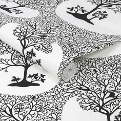 black and white tree wallpaper with trees on it