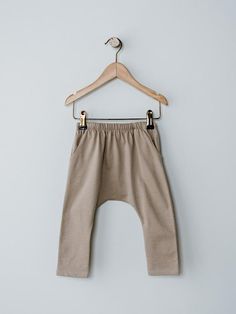 Comfort and style come together perfectly in this playtime favorite. Featuring a dropped crotch, harem silhouette, and hidden drawstring in the waistband, this trouser is made with our luxuriously soft organic cotton. Pair it with any of our cozy basics like The Boxy Tee or our Short Sleeve Pocket Onesie. Reshape whils