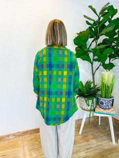 When the vacation vibes are calling, the Vacation Booked Button Down is the answer! With its playful blue and green hues, this lightweight shacket is your go-to for layering over anything from a chic jumpsuit to your favorite jeans. Perfect for breezy fall days, it’s an effortless addition to your wardrobe that’s as versatile as it is stylish. Wear it for a stroll through a fall farmers market or to cozy up at a weekend bonfire, and let this button-down become your ultimate travel companion. PRO Casual Green Button-up Outerwear, Casual Beach Outerwear, Green Relaxed Fit Button-up Outerwear, Casual Cotton Beach Outerwear, Green Button-up Outerwear For Day Out, Casual Cotton Outerwear For Vacation, Green Casual Relaxed Fit Outerwear, Green Relaxed Fit Casual Outerwear, Casual Green Relaxed Fit Outerwear