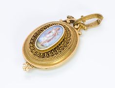 Antique Locket.Victorian Etruscan revival 14K yellow gold enamel and pendant locket.Approximate Measurements: Length: 2.8" Width: 1.4"Weight: 31.4 Grams. Antique Jewelry Historical Medallion Jewelry For Weddings, Historical Medallion Design Jewelry For Wedding, Medallion Jewelry With Historical Design For Weddings, Antique Medallion Jewelry With Historical Design, Victorian Enamel Jewelry For Ceremonial Occasions, Victorian Medallion Jewelry With Historical Design, Victorian Medallion With Historical Design Jewelry, Ceremonial Antique Gold Locket Jewelry, Victorian Engraved Yellow Gold Locket Necklace