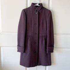 J Crew Coletta Double Cloth Italian Wool Coat Features: Button Front Mandarin Collar Lined Two Pockets 95% Wool 6% Nylon Double Cloth By Manifattura Di Carmignano Italy Style 29578 Color: Plum/Purple Size 2 Good Preowned Condition Approximate Measurements Laying Flat Pit To Pit 17” Length 32” Elegant Fitted Pea Coat With Button Cuffs, Fitted Outerwear With Covered Buttons For Workwear, Fitted Button-up Pea Coat With Button Cuffs, Fitted Button-up Pea Coat For Work, Wool Outerwear With Buttons For Daywear, Elegant Daywear Blazer With Buttons, Fall Blazer With Buttons, Fall Daywear Blazer With Buttons, Elegant Button-up Outerwear For Daywear