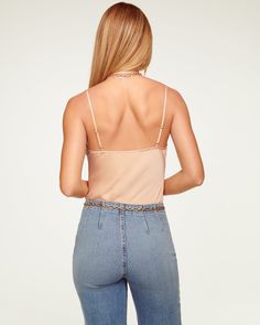 Calling all cami lovers - Abigail was made for you. Frame your figure in this classic top, crafted in the best of satin charmeuse in a rainbow of colors sure to spark joy. Pair with your favorite high waisted denim and a statement necklace and watch this elevated classic take center stage. Size & Fit – This style runs small, we suggest sizing up. – Model is Wearing Size XS– Model is 5'9" Size Guide Details & Care – Dry Clean or Hand Wash– Style #: A0221116 Free Delivery & Easy Returns We offer f Satin Tops With Adjustable Straps, Satin Top With Adjustable Straps, Satin Tank Top With Adjustable Straps For Night Out, Satin Cami Top For Date Night, Satin Camisole For Date Night, Trendy Satin Cami Top, Cowl Neck Tank Top, Ramy Brook, Spark Joy