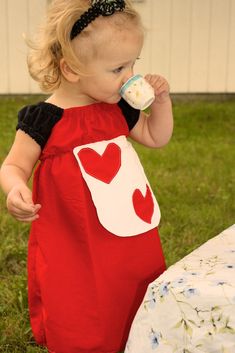 This Queen of Hearts Costume is a peasant dress sizes 4T-6X. Cinched at the chest for comfort and aesthetics, it's perfect for Halloween. You can find Alice by clicking on this link https://www.etsy.com/listing/109050904/alice-in-wonderland-costume Last day for orders being delivered by Halloween is October 11th. After that, a RUSH ORDER fee needs to be chosen under shipping. If it is not chosen, it is not guaranteed by Halloween. Need it quicker? Here is my rush fee for quicker production---&gt Star Wars Masks, Heart Costume, Queen Of Hearts Costume, Girls Costumes, Wonderland Costumes, Peasant Dress, Queen Of Hearts, Lovely Dresses, Girl Costumes