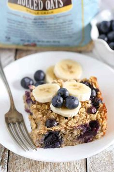 blueberry banana baked oatmeal on a plate with a fork