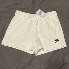 New With Tag Women’s Mid Rise Standard Fit Cotton Shorts. 100% Cotton White With A Black Nike Logo On The Left Side. Nike White Breathable Shorts, Nike White Athletic Shorts With Go-dry Technology, Nike Quick-dry Shorts, Nike Bottoms With Built-in Shorts And Short Inseam, Black Nike Logo, Nike Cotton Shorts With Moisture-wicking, Teal Nikes, Nike Shorts Women, Nike Tempo Shorts