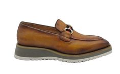 Calfskin Slip-On Horsebit Loafer Cognac Stunning Burnished Textured Calfskin slip-on Loafer from our Exclusive Maurice collection features Silvertone Horsebit Buckle over Tri Colored Ribbon, full Leather Lining, a clean welt and a Lightweight Tri Colored Rubber Sole! More sizes to arrive by the end of October. Brown Textured Sole Slip-ons For Office, Brown Formal Platform Loafers With Stitched Sole, Brown Brogue-detailed Slip-on Platform Loafers, Brown Brogue Platform Loafers Slip-on, Brown Slip-on Platform Loafers For Formal, Brown Slip-on Platform Loafers For Formal Occasions, Brown Slip-on Moccasins For Office, Brown Slip-ons With Textured Sole For Office, Brown Slip-on Platform Loafers For Business