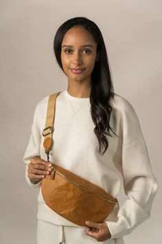 Discover the Sling Body Bag: where sophistication meets practicality. This sleek crossbody bag rests comfortably across your chest, with a compact space for your phone, wallet, and essentials. Versatile Chest Bag For Mobile Phone On-the-go, On-the-go Crossbody Chest Bag With Phone Bag, On-the-go Crossbody Chest Bag With Phone Pocket, Everyday Crossbody Chest Bag With Cell Phone Pocket, On-the-go Mobile Phone Crossbody Chest Bag, Everyday Crossbody Belt Bag, Versatile Chest Bag With Detachable Strap For On-the-go, Versatile Chest Bag With Detachable Strap, Modern Chest Bag With Mobile Phone Bag For On-the-go