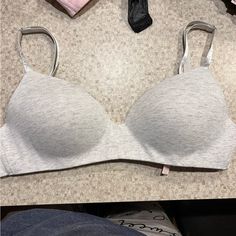 Wireless Bra. 34d. Heathered Grey. Never Worn But Washed. Victoria's Secret Gray Bra, Padded Cups Bra For Loungewear, Fitted Padded Bra For Loungewear, Fitted Nursing Bra For Loungewear, Nursing Bra For Loungewear, Wireless Bra, Women's Intimates, Heather Grey, Victoria's Secret